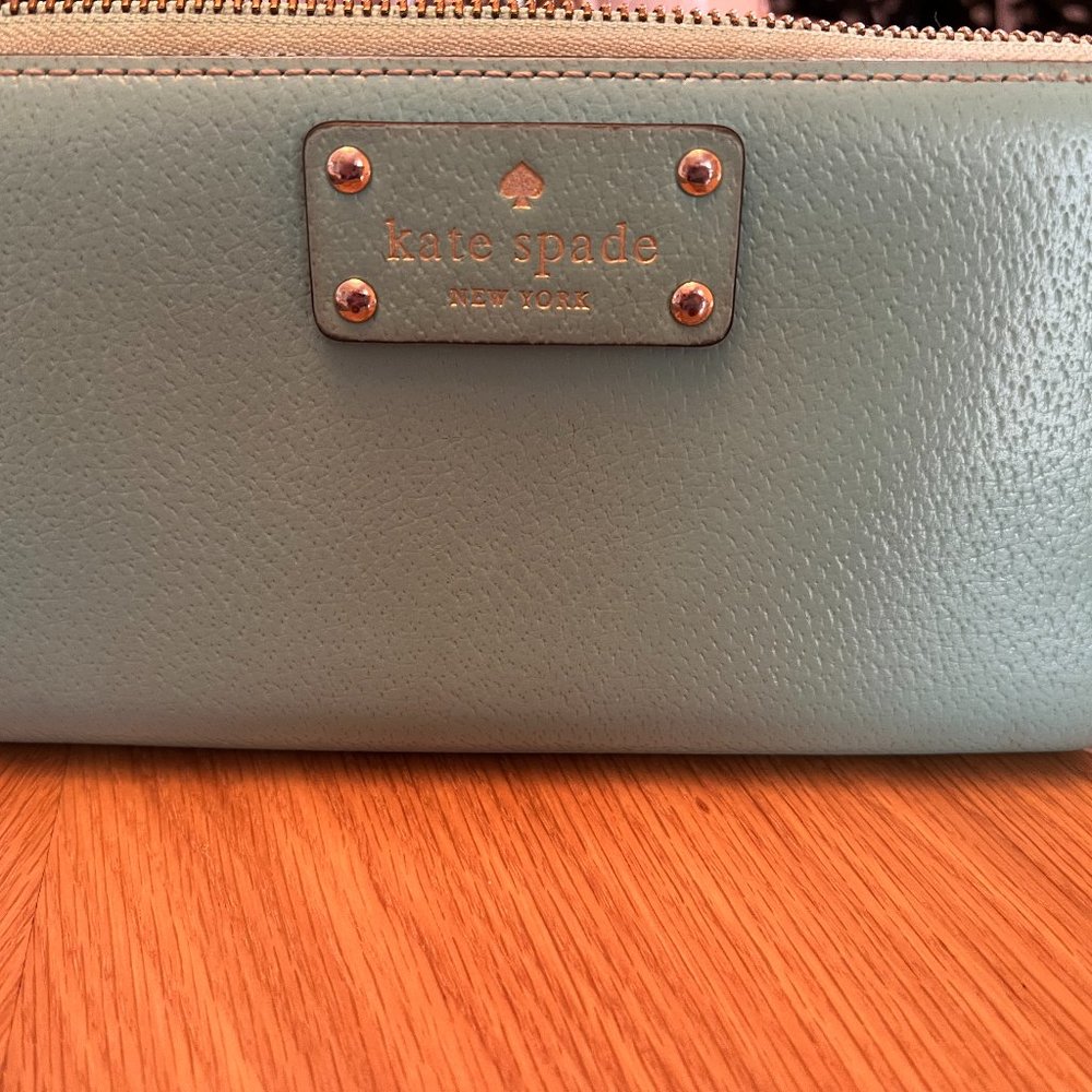 Kate Spade turquoise wallet with polka dot interior